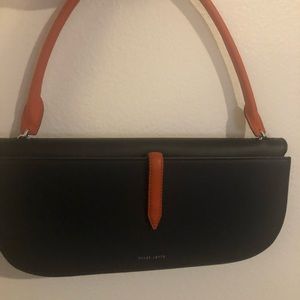 Stylish two tone Black and orange leather shoulder bag